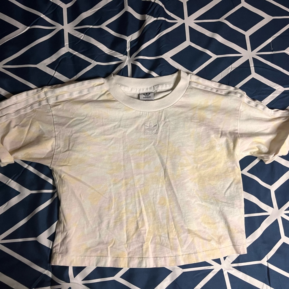 This is a small pastel color wash Adidas shirt!!